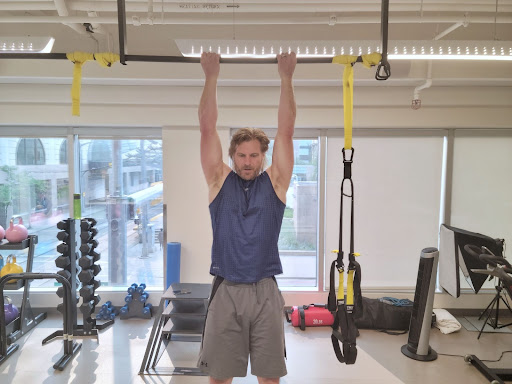 The writer of these lines doing chin-ups to eliminate joint pain