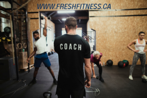 fitness coach with his clients
